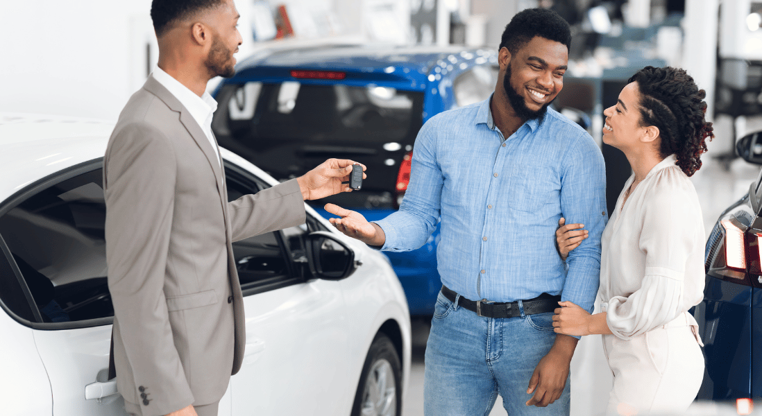 a couple buy a used car from a private seller