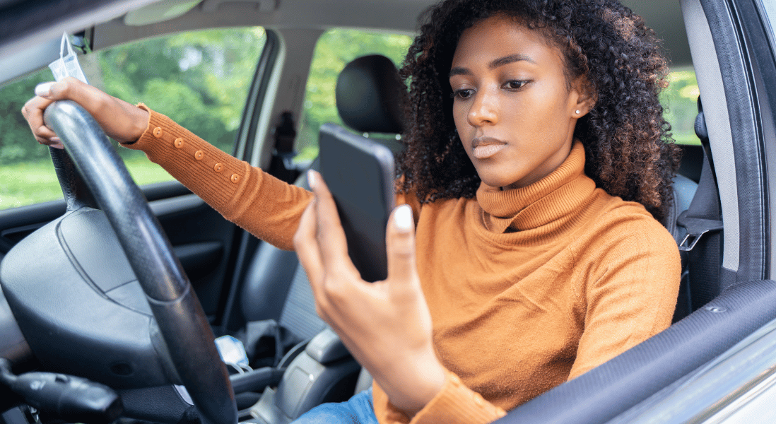 female on mobile distracted driving